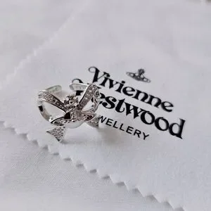 Vivienne Westwood | Jewelry | Vivienne Westwood Bow Ribbon Logo 